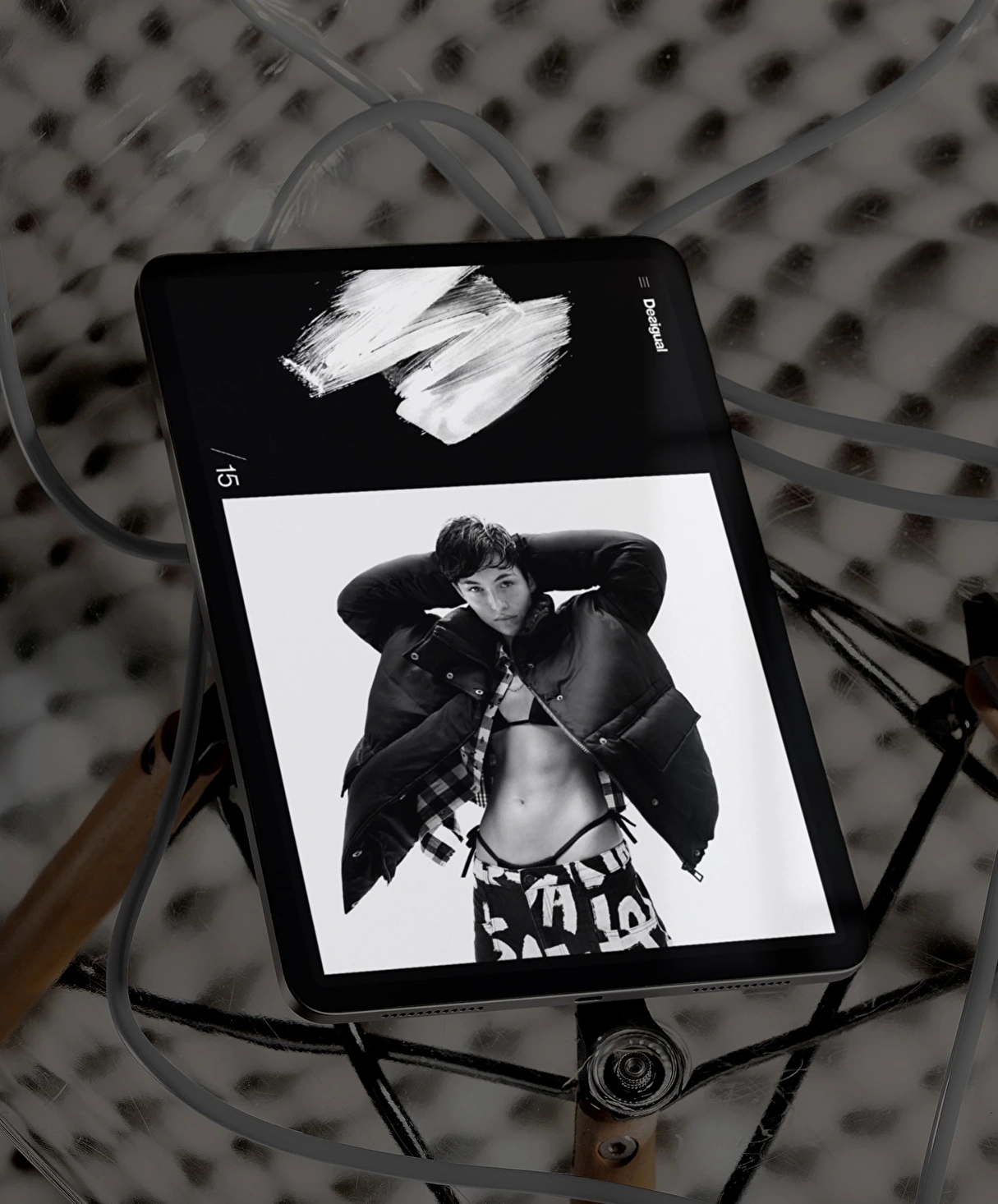 Ipad displaying the clear navigation of the Desigual homepage  B2B application.